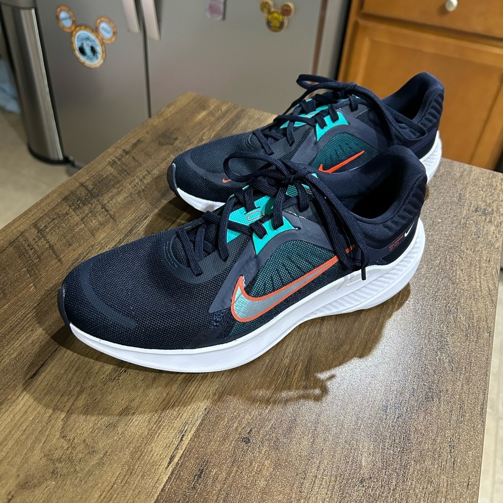 Nike Women’s blue and teal sneakers